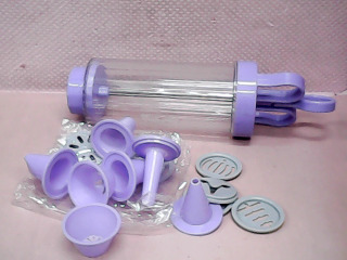 擠奶油器