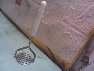 壓泥器