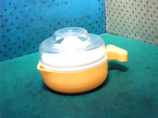 壓汁器