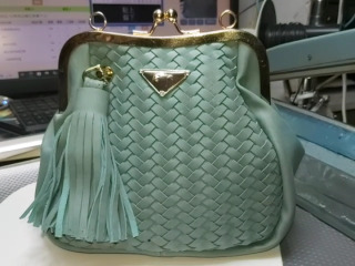 編織流蘇口金包