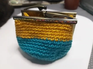 針織手提口金包