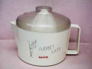 壓汁器