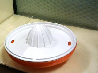 壓汁器