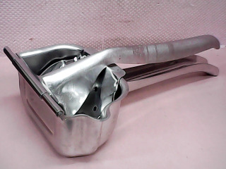壓汁器