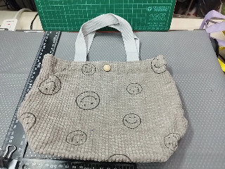 微笑手提袋